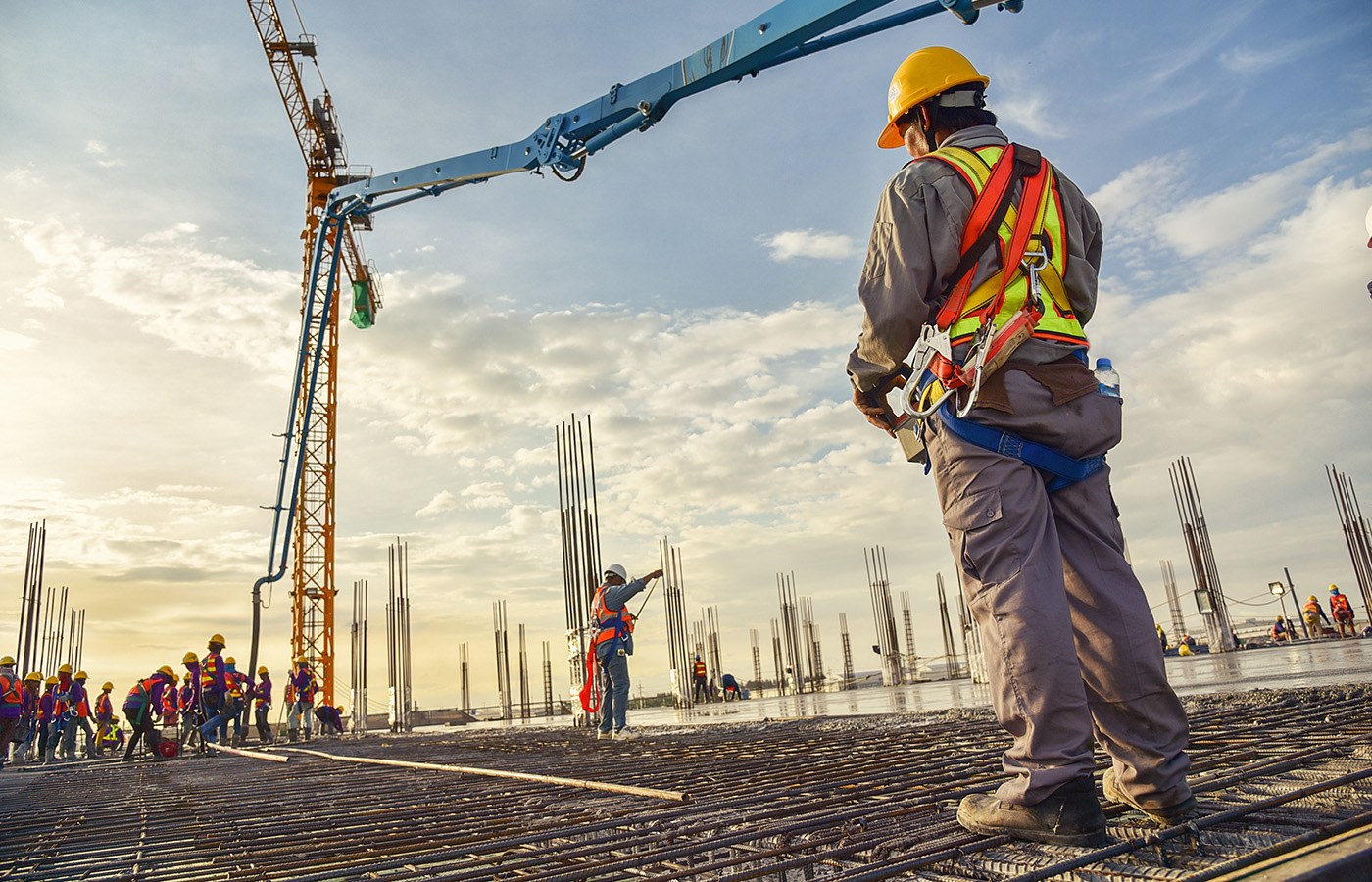 Construction site with workers representing construction company clients of SERP Maverick