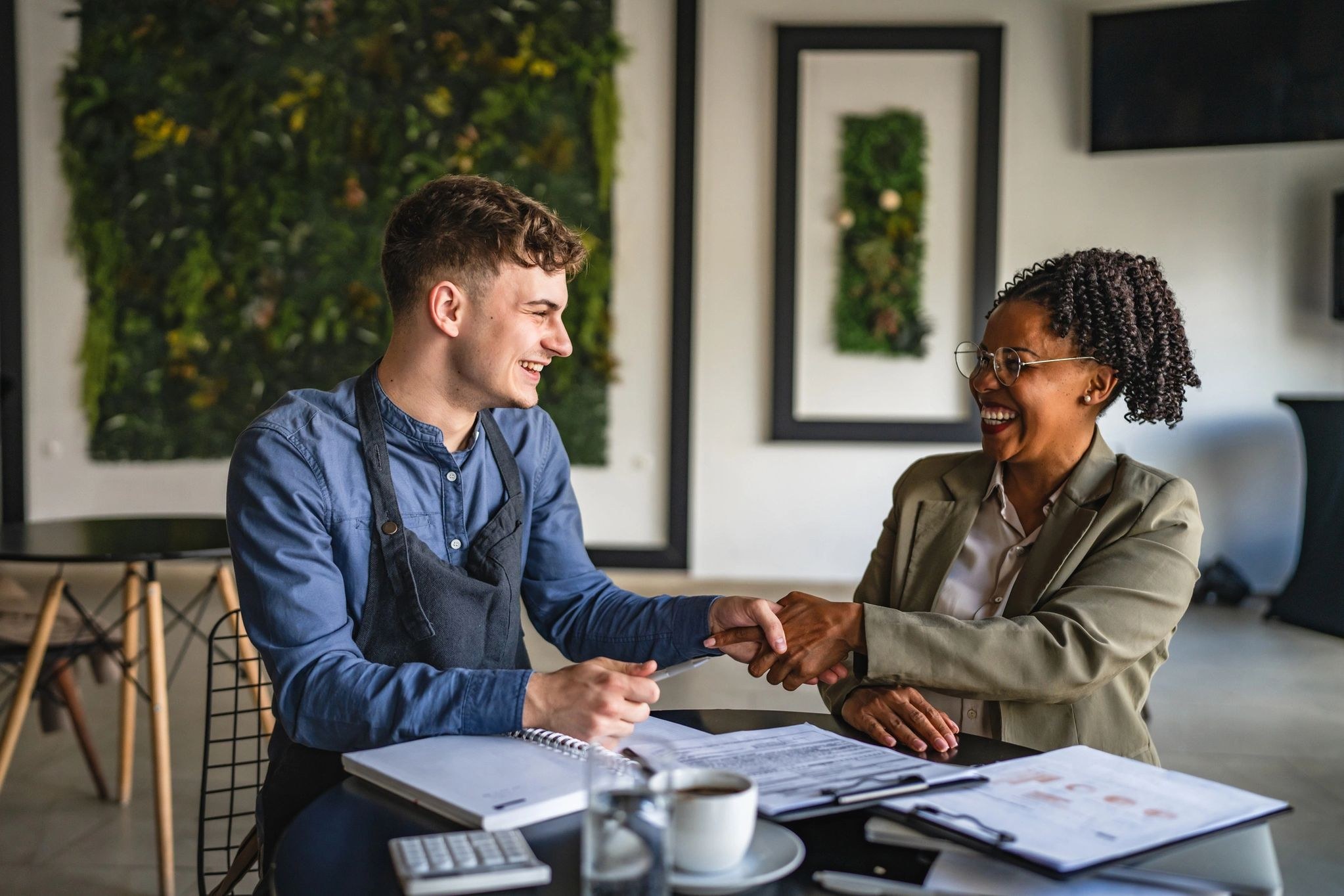 Marketing reports and notes representing marketing audit and coaching services
